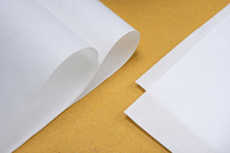 CARTA KRAFT BIANCA MONOLUCIDA 30GR 25x25  CF=10KG